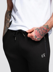 Men's sweatpants with ribbed legs and rubber print - black V1 OM-PASK-0223