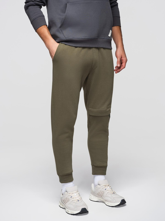 Pantaloni de trening pentru bărbați cu cusături și fermoar pe picior - olive V3 OM-PASK-0147