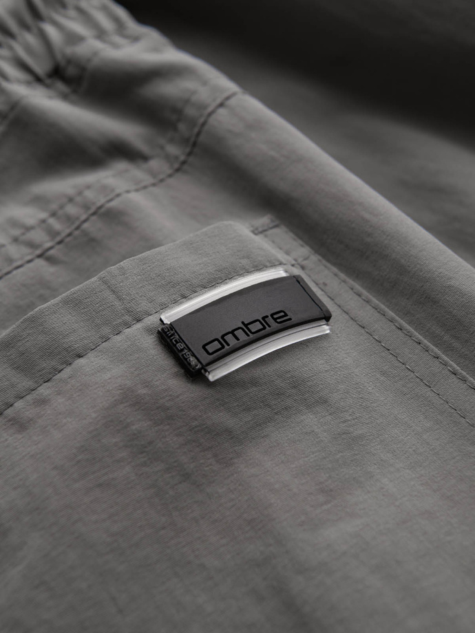 Vyriškos džogerio kelnės su kišenėmis ir spauda - pilkos spalvos V4 OM-PAJO-0200