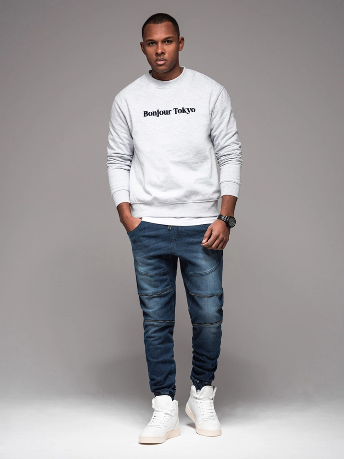 Pánske džínsové nohavice s roztrhaním a zipsom - tmavomodré V1 OM-PADJ-0243