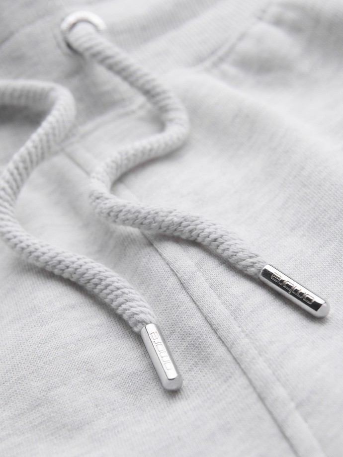 Pánské tepláky s lemováním a žebrováním na nohavicích - šedý melír V1 OM-PASK-0258