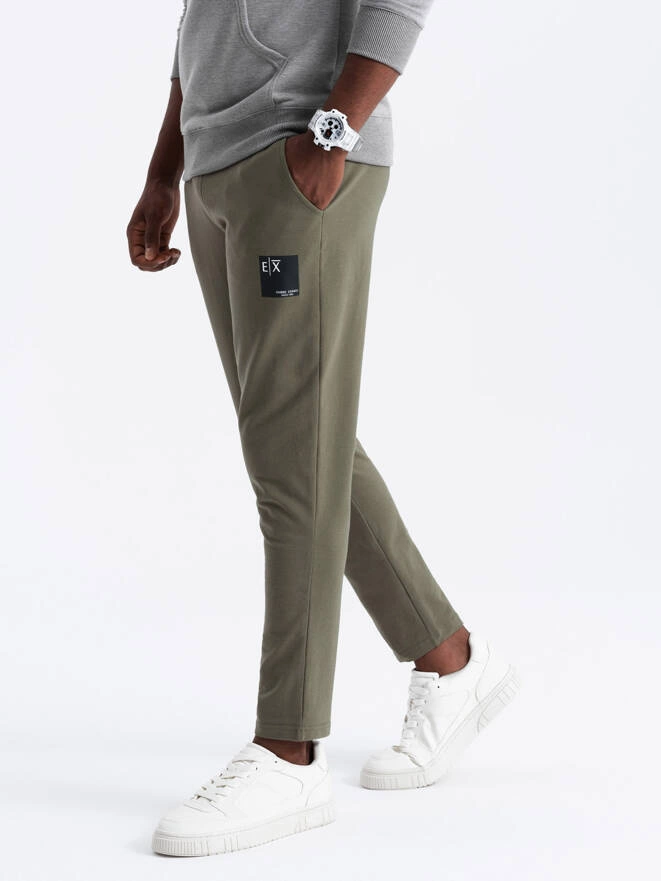 Pantaloni de trening pentru bărbați cu logo - olive V4 OM-PASK-0167