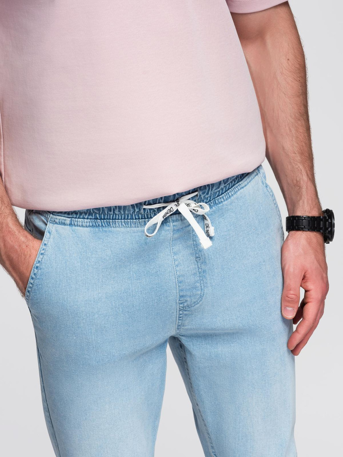 Pantaloni JOGGERS din denim cu efect de spălare pentru bărbați - albastru deschis V1 OM-PADJ-0267