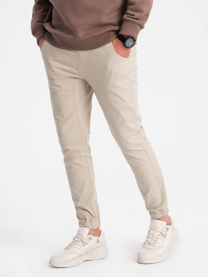 Pantaloni bărbătești din material textil JOGGERS - bej V10 P885