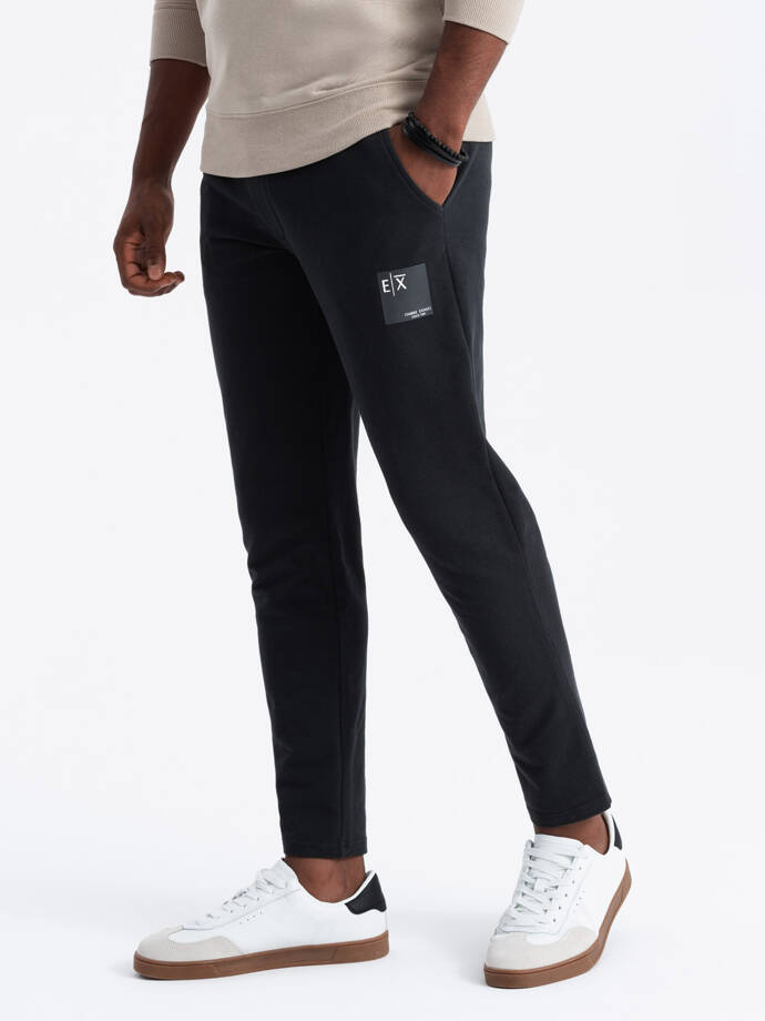 Pantaloni de trening cu logo pentru bărbați - negru V1 OM-PASK-0167